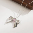 Trixie Bow earrings and necklace