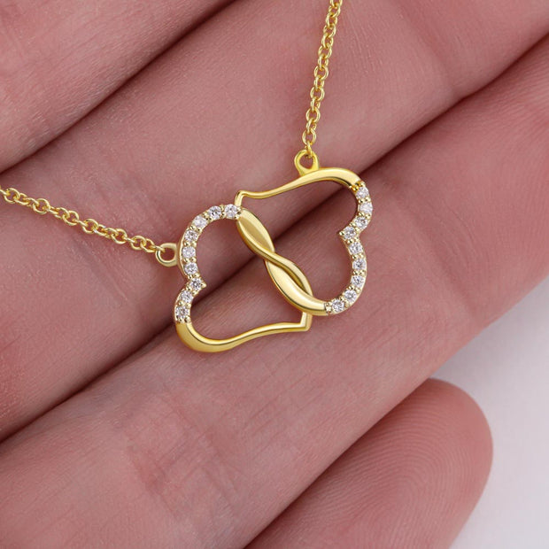 Our love is solid 10k gold, double gold hearts necklace